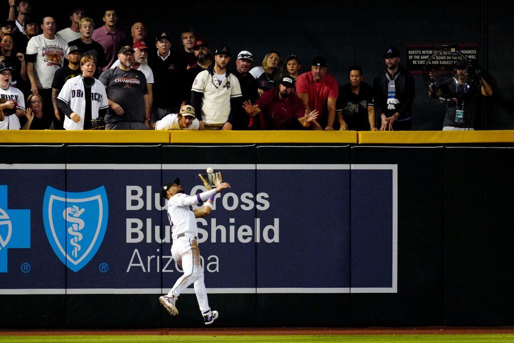 World Series: Rangers outlast Diamondbacks in Game 5 for 1st title