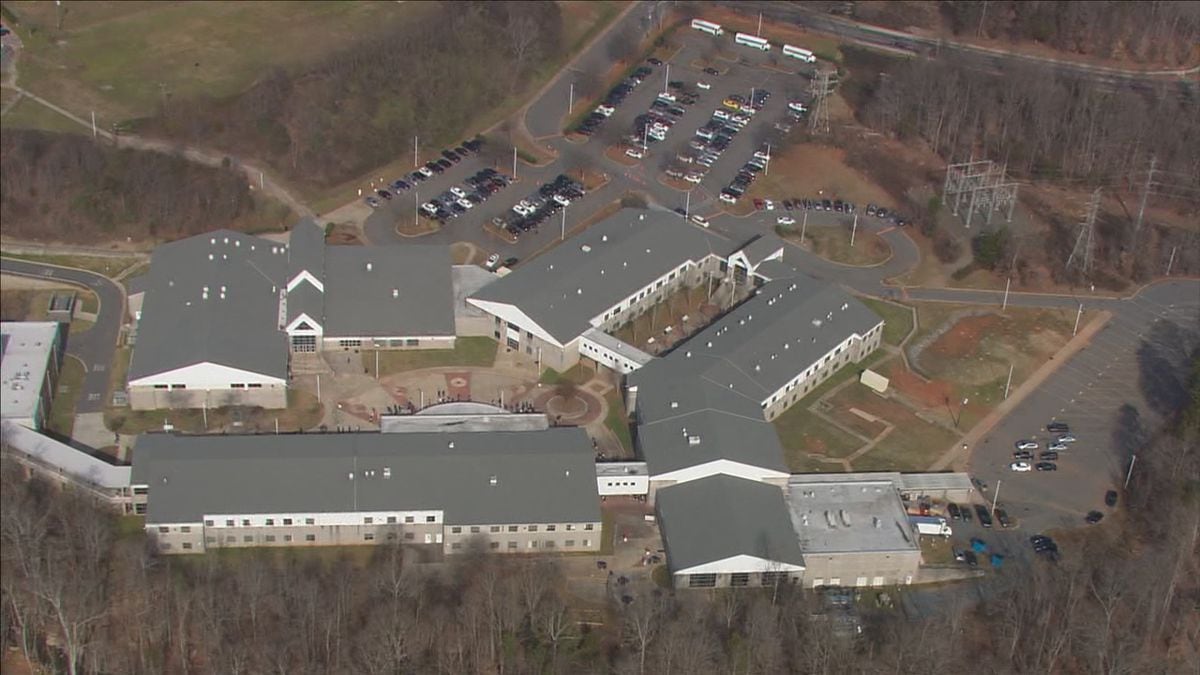 Suspect in custody after gun found in bushes on campus of Vance High School